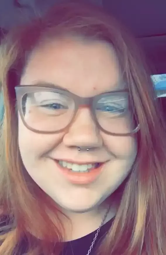Fresh septum piercing featuring titanium internally threaded circular barbell done by Amber Paje of James River Tattoo in Carrollton Virginia